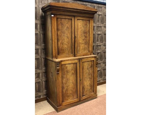 WILLIAM IV MAHOGANY ESTATE CABINET, the arched cornice with two panel doors below enclosing a fitted interior with lettered p