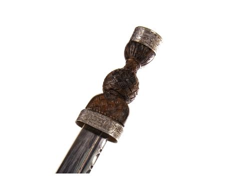 SILVER MOUNTED DIRK, thistle embossed collar, basket weave effect carved wooden handle with a stone set pommel, together with