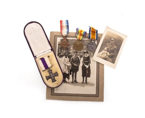 MILITARY ARCHIVE RELATING TO GEORGE CHARLTON KILLEY, M.C., TANK CORPS, including Killey's Military Cross, in case, with photo