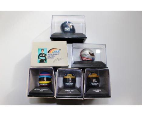 Six Minichamps 1/8 scale F1 helmets, boxed 