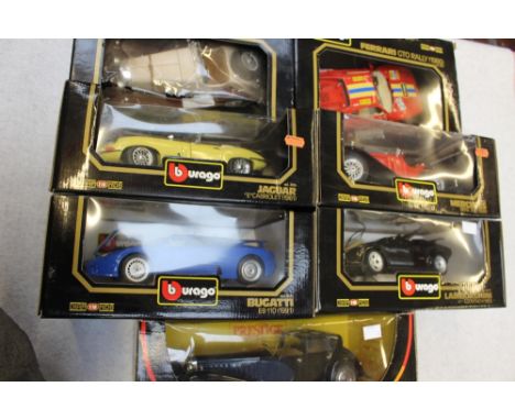 A group of seven large scale diecast vehicles by Bburago and Solido 