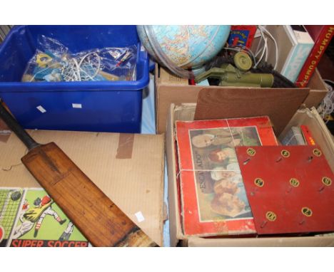 A quantity of vintage toys to include tinplate, world globe, cricket bat, super soccer game, books, etc (q) 