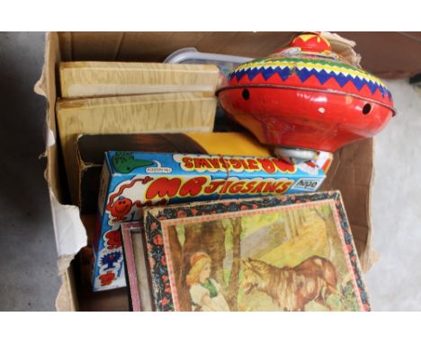 A collection of toys, 1900 onwards including puzzles, Lego sets, printing blocks, Chad Valley spinning top, cards, etc 