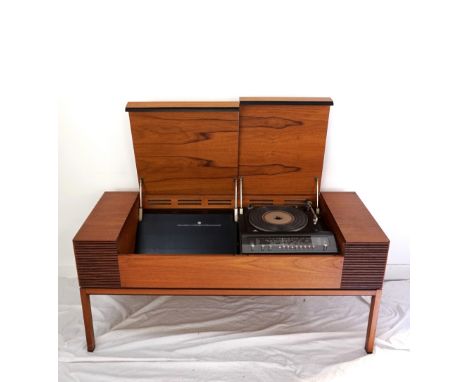 'BANG AND OLUFSEN' MUSIC CENTREcontained in a teak cabinet with two lift up lids revealing a Beomaster 900 combination record