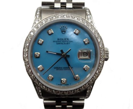GENTLEMAN'S ROLEX OYSTER PERPETUAL DATE JUST WRISTWATCHwith a diamond set bezel and shoulders around a blue Tahitian mother o