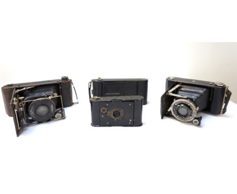 SMALL COLLECTION OF 1920/30's FOLDING CAMERAScomprising a C.P.Goerz Roll-Tengor 6x9; Houghton-Butcher with "Mulchro" shutter;
