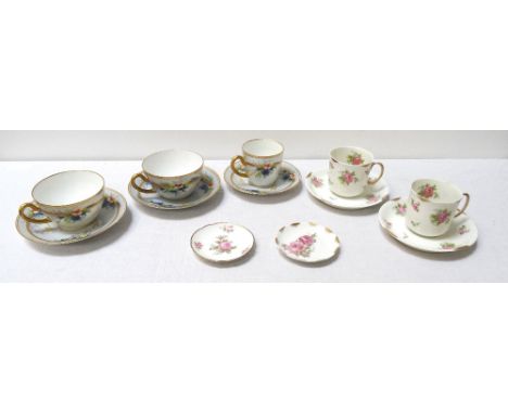 'LIMOGES' PORCELAIN PART COFFEE SERVICEwith floral and gilt decoration, comprising four cups, seven saucers, and two small di