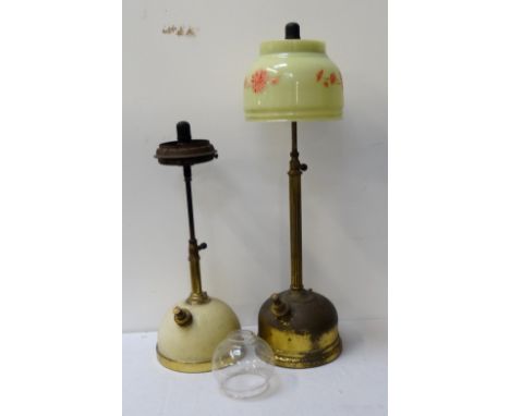 VINTAGE BRASS TILLEY LAMPwith a reeded column above a domed reservoir, with a yellow glass shade decorated with red flowers, 
