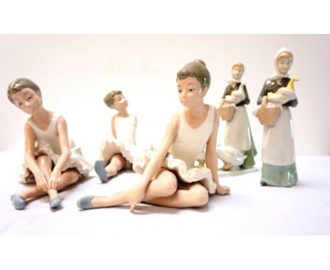 THREE NAO FIGURINEScomprising three young girls in ballet outfits, two Graefenthal figurines depicting a woman holding a duck