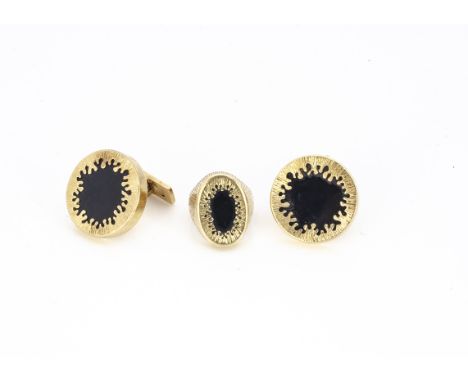 A pair of 18ct gold and onyx cufflinks, of circular design with fixed and snap posts, with matching signet ring, all designed