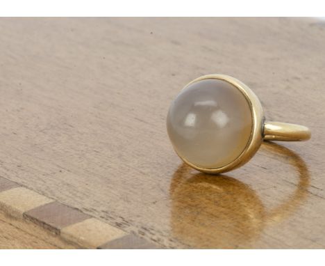 A 19th Century 18ct gold agate ring, the cabochon simple set stone on a plain gold shank marked with crown and 18 to mount, r