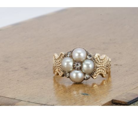 A 19th Century diamond and pearl sweetheart ring, the quatrefoil setting with rose cut diamonds and natural half pearls flank