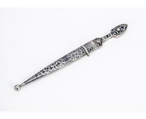 An early 20th century Russian letter opener, in the form of a dagger and scabbard having niello enamel decoration, with stamp