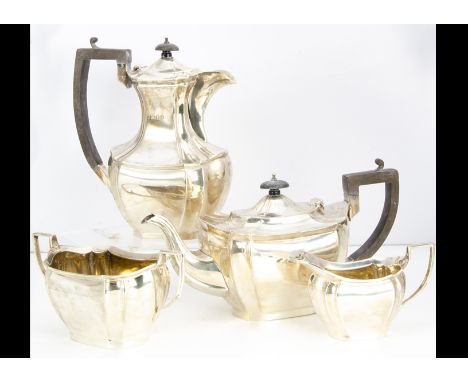 A four piece George V silver tea set by Charles Boynton &amp; Son, 55.5 ozt, in the traditional taste, with teapot, hot water