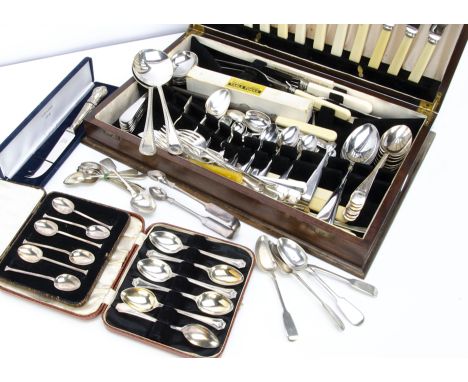 A collection of silver and silver plated flatware, including a modern silver handled cheese knife in box, a pair of Scottish 