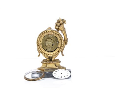 A damaged 19th Century mantle clock, with pocket watch style movement, appears to run, within carved wooden and gilt classica