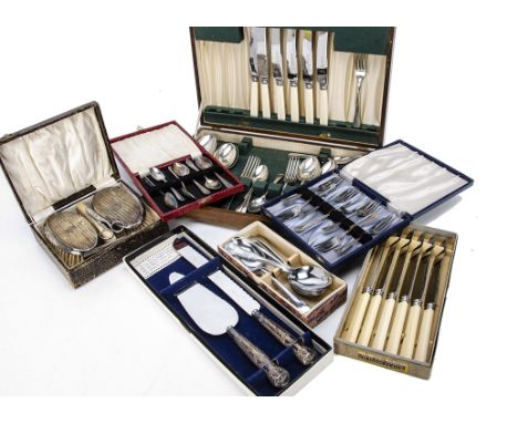 A collection of silver plate, including various flatware, together with a silver handled cake knife and bread knife set 
