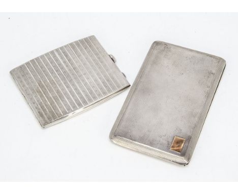 Two Art Deco period silver cigarette cases, 12.45 ozt, the larger 14.5cm and with applied gold panel to one corner (2) 