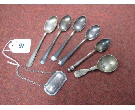 A Hallmarked Silver Caddy Spoon, FH, Sheffield 1955 (9.4cm long); a hallmarked silver decanter label, inscribed "Presented by
