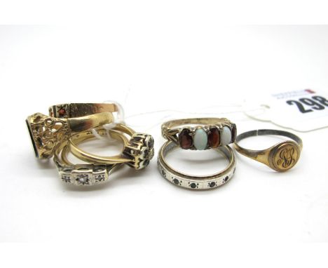 A 9ct Gold Wedding Band, (finger size J1/2), a 9ct gold signet style ring with rectangular hardstone panel, within openwork s
