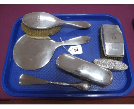 A Hallmarked Silver Three Piece Dressing Table Set, (marks rubbed), together with a hallmarked silver backed brush, with engi