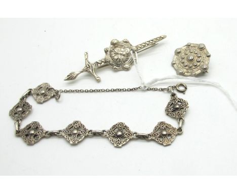 Alexander Ritchie IONA Celtic Design Shield Brooch, stamped "IONA" "AR"; together with a hallmarked silver Celtic sword and s
