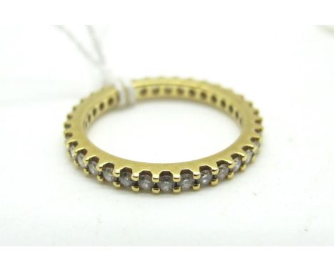 A Modern 18ct Gold Full Eternity Style Ring, (finger size K) (2grams).