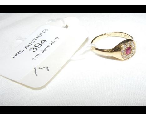 A ruby and diamond ring in 18ct gold setting CONDITION REPORT4g