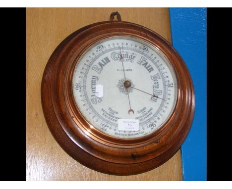 A 32cm diameter aneroid wall barometer 