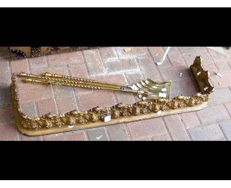 A decorative antique fire fender - 100cm, together with a set of antique fire tools
