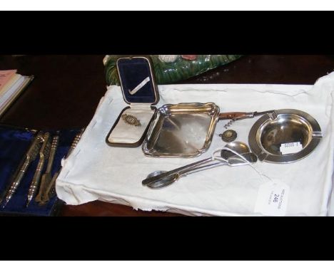 A silver ashtray, spoon, etc. 