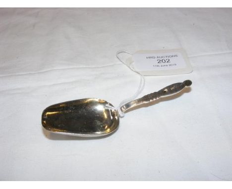 An antique Russian silver tea caddy spoon 