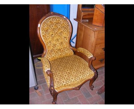 Victorian button back armchair with cabriole front supports 
