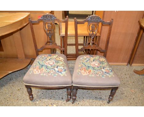 A pair of late Victorian tapestry covered bedroom chairs