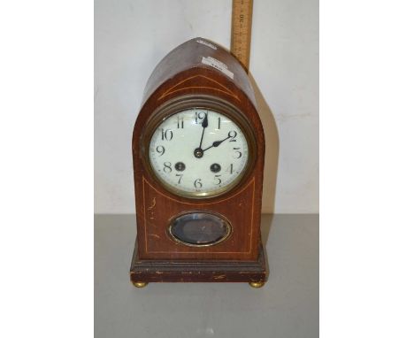 An Edwardian mantel clock in lancet shaped case