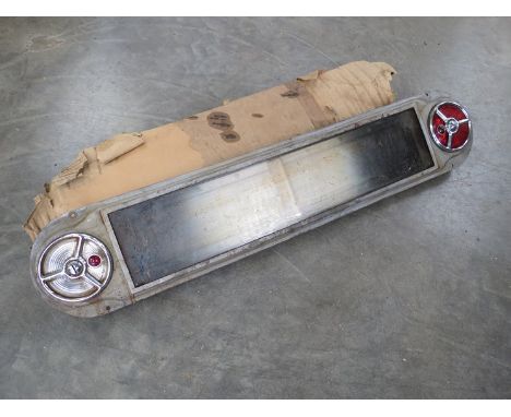 A circa 1950's rear light cluster with illuminated number plate holde