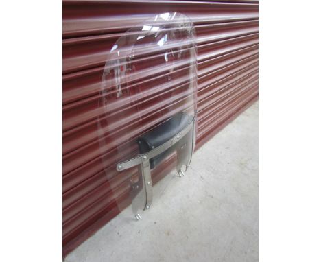 A Harley Davidson visor with leather pouch