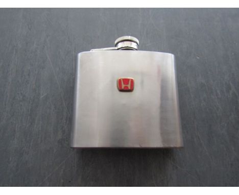 A hip flask "Honda" emblem to front 