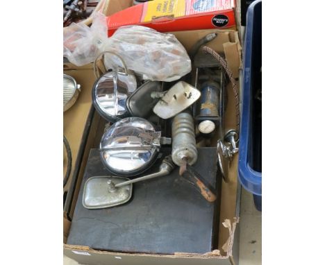 A box of fuel filters spot lights and tools 