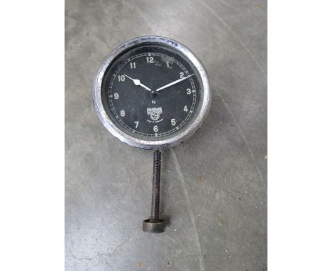 A vintage Smith's car clock (white hands)