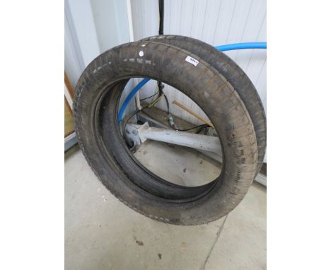 Two Dunlop reinforced vintage tyres
