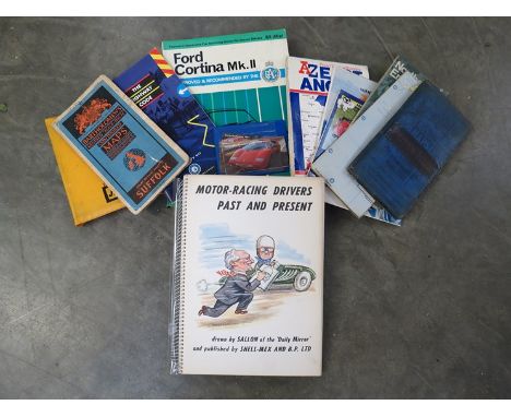 A quantity of vintage motoring maps, a motor racing driver cartoon publication, cortina manuals etc 