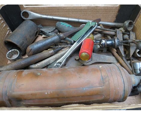 A box of tools including a vintage fire extinguisher 