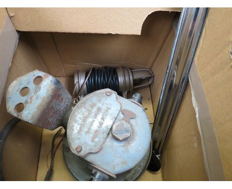 A claxton horn, a demister and a lead light 