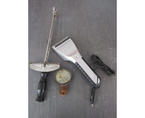 A vintage torque wrench, a heated windscreen clearer and a Desmo motorcycle tax disc holder 