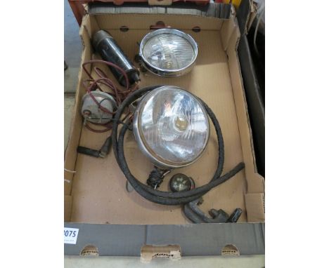 A box containing a quantity of miscellaneous auto parts, including a vintage 'Handy Lamp', chrome lamps etc 