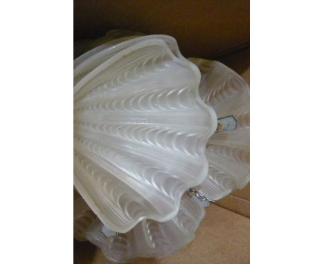 A pair of opaque glass deco ceiling hanging light shades