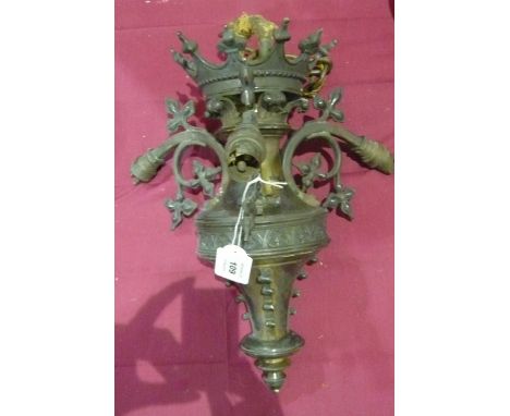 A late 19th century brass gothic light fitting with three arms, suspended on a heavy chain, 40cm high (excluding chain)
