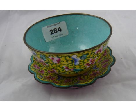 A yellow ground canton enamel bowl on scalloped edge stand with floral decoration, 11cm max x 6.5cm high (chipped)