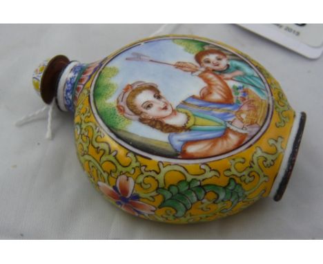A canton enamel scent bottle with yellow floral background to central figural cartouches depicting woman and young, with stop